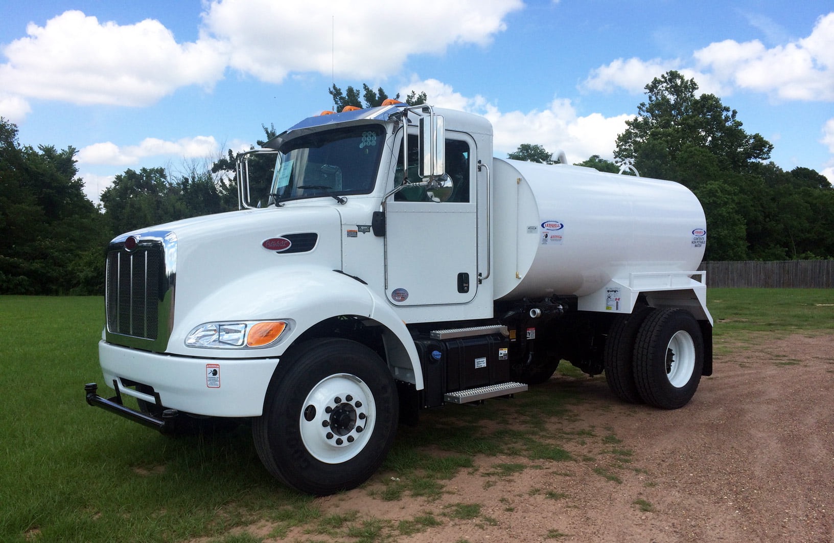 White Ledwell water truck shown on the original WaterTruck.Rentals website